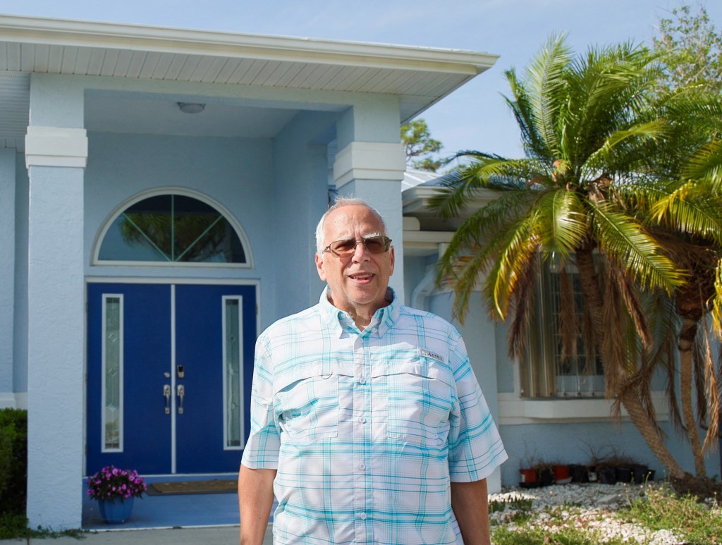 Louis Lou Prevost, eldest brother of Pope Leo XIV, poses for a portrait outside his home in Port Charlotte, Florida, U.S., May 9, 2025. 