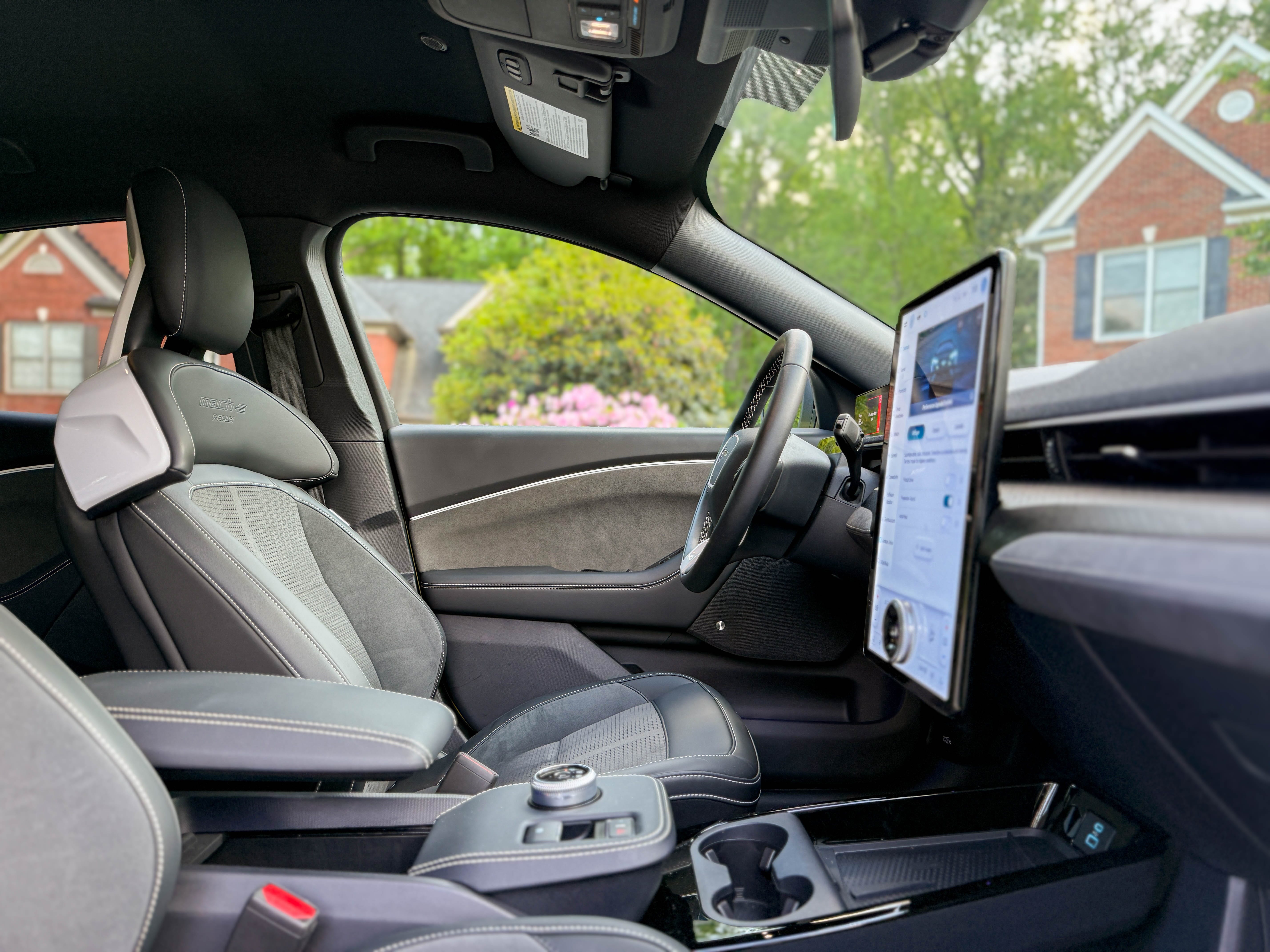 The front cabin of a 2025 Ford Mustang Mach-E Rally EV SUV.