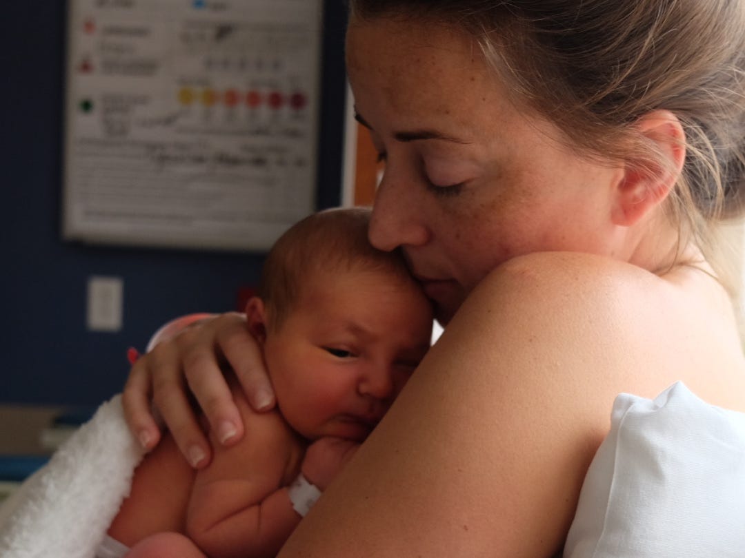 Mom holding baby