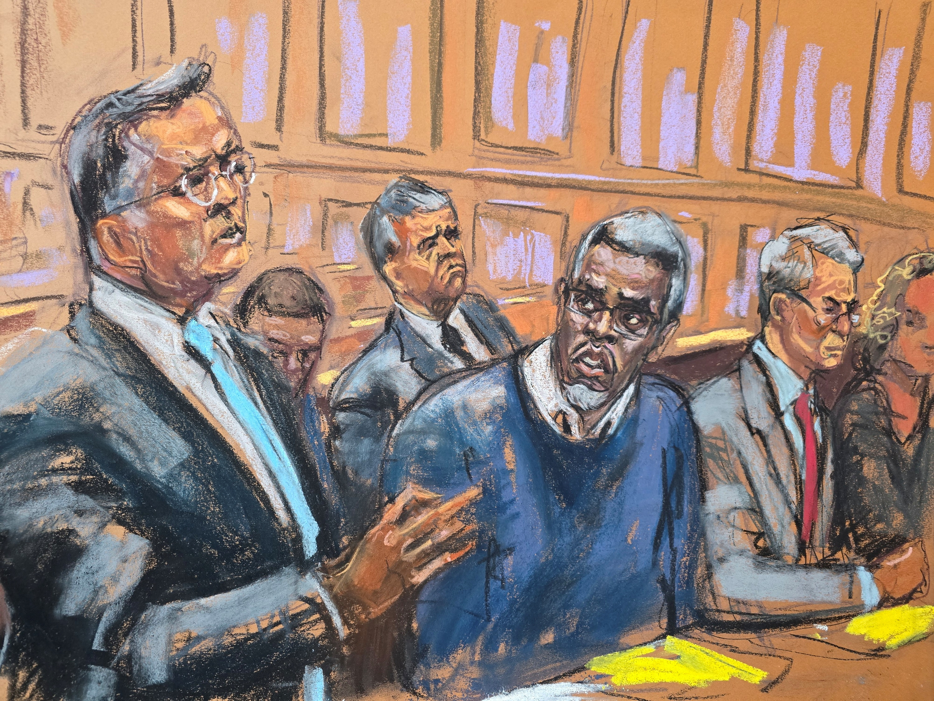 A court sketch of Diddy and his legal team.