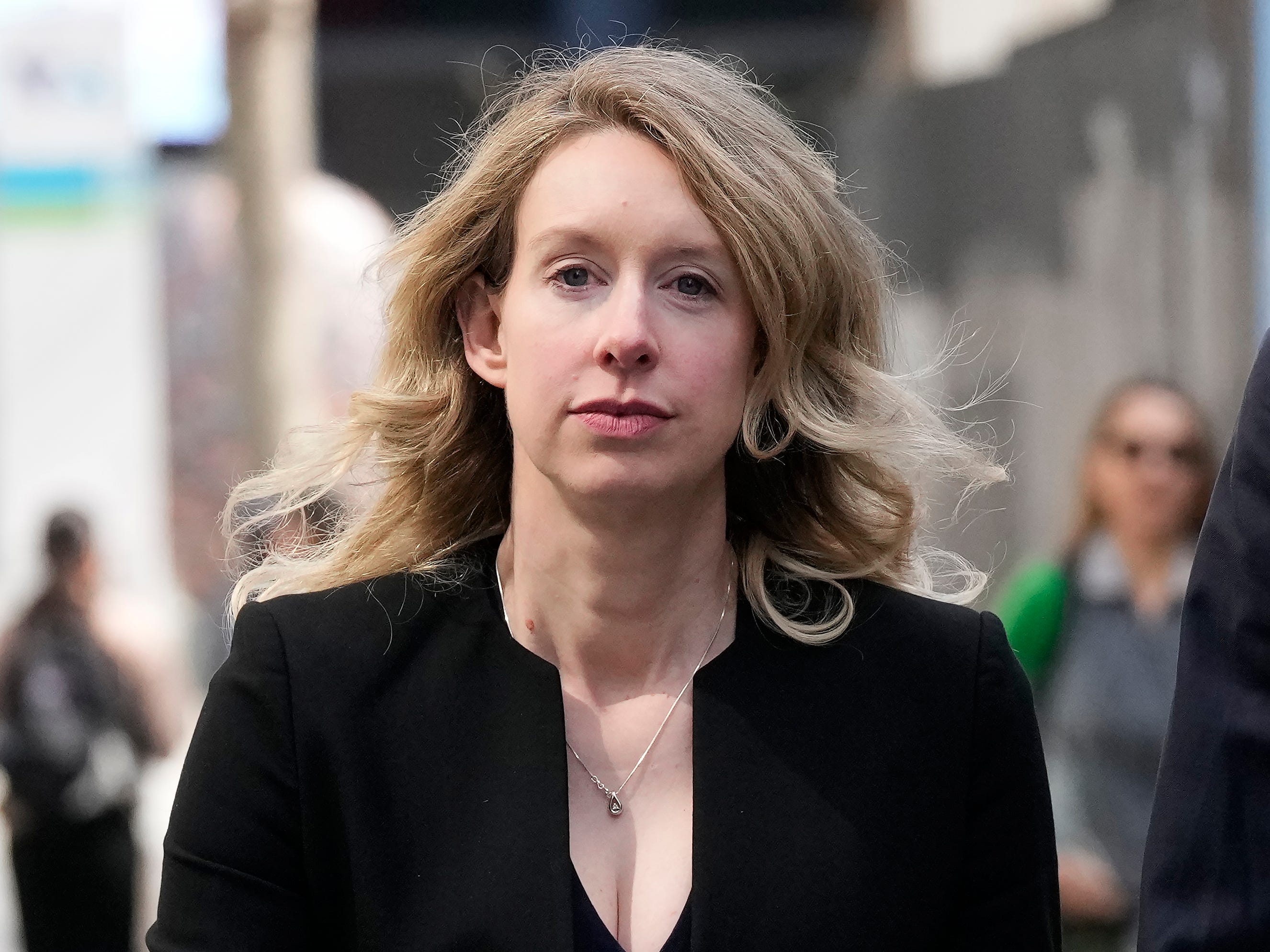 FILE - Former Theranos CEO Elizabeth Holmes leaves federal court in San Jose, Calif., March 17, 2023. On Monday, April 10, Holmes was rebuffed in her attempt to stay out of federal prison while she appeals her conviction for the fraud she committed while overseeing a blood-testing scam that exposed Silicon Valley’s dark side.