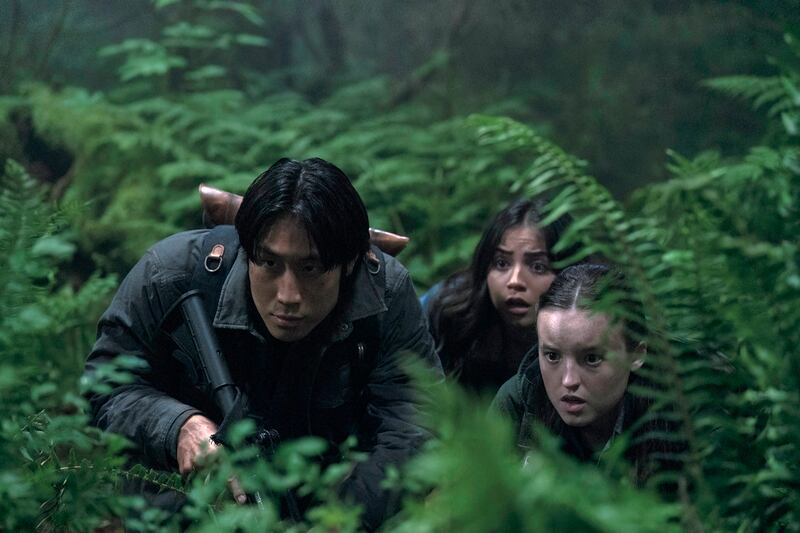 Young Mazino, Bella Ramsey, and Isabela Merced in The Last of Us.