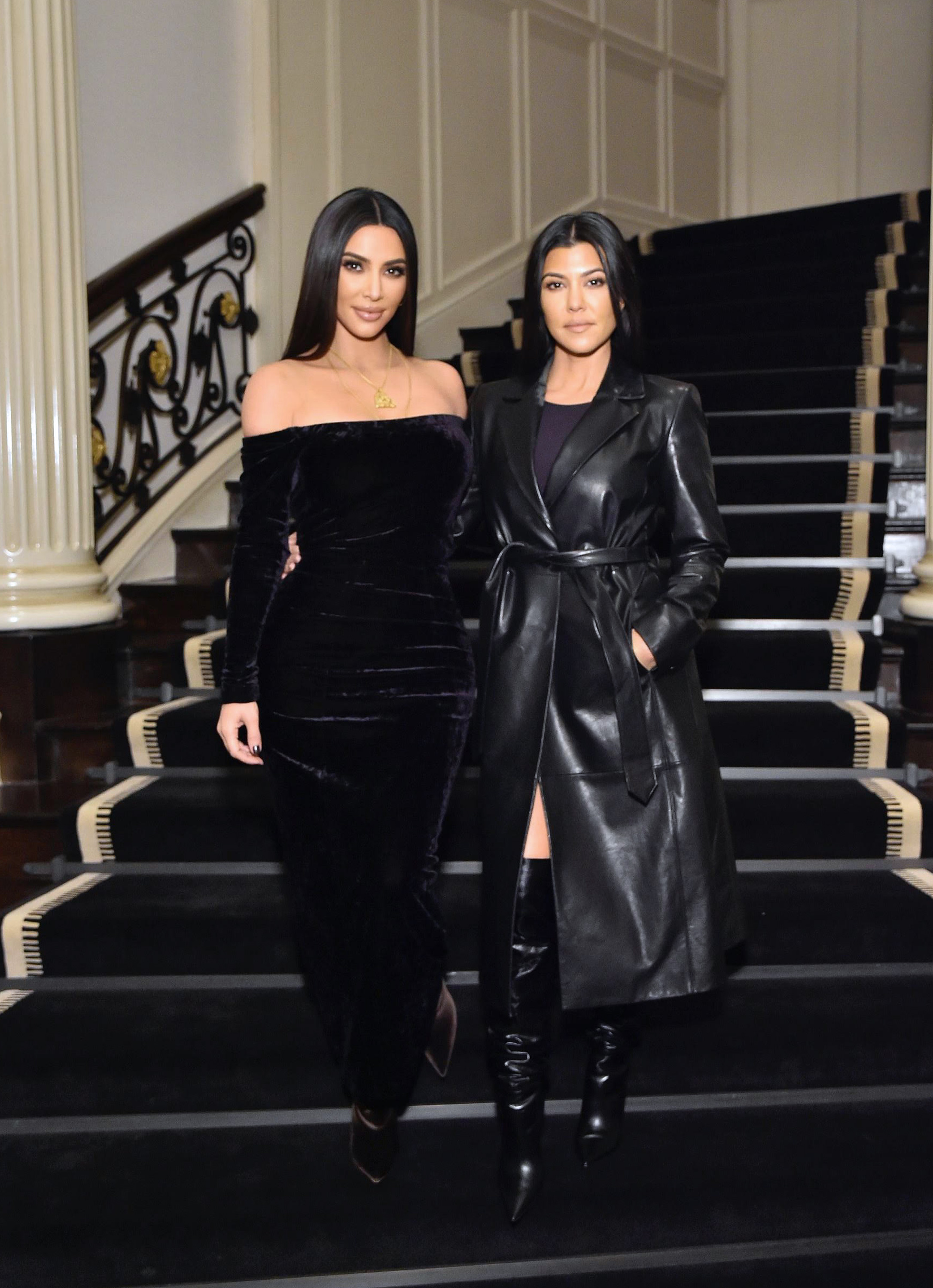 Kourtney Kardashian and Kim Kardashian in 2019