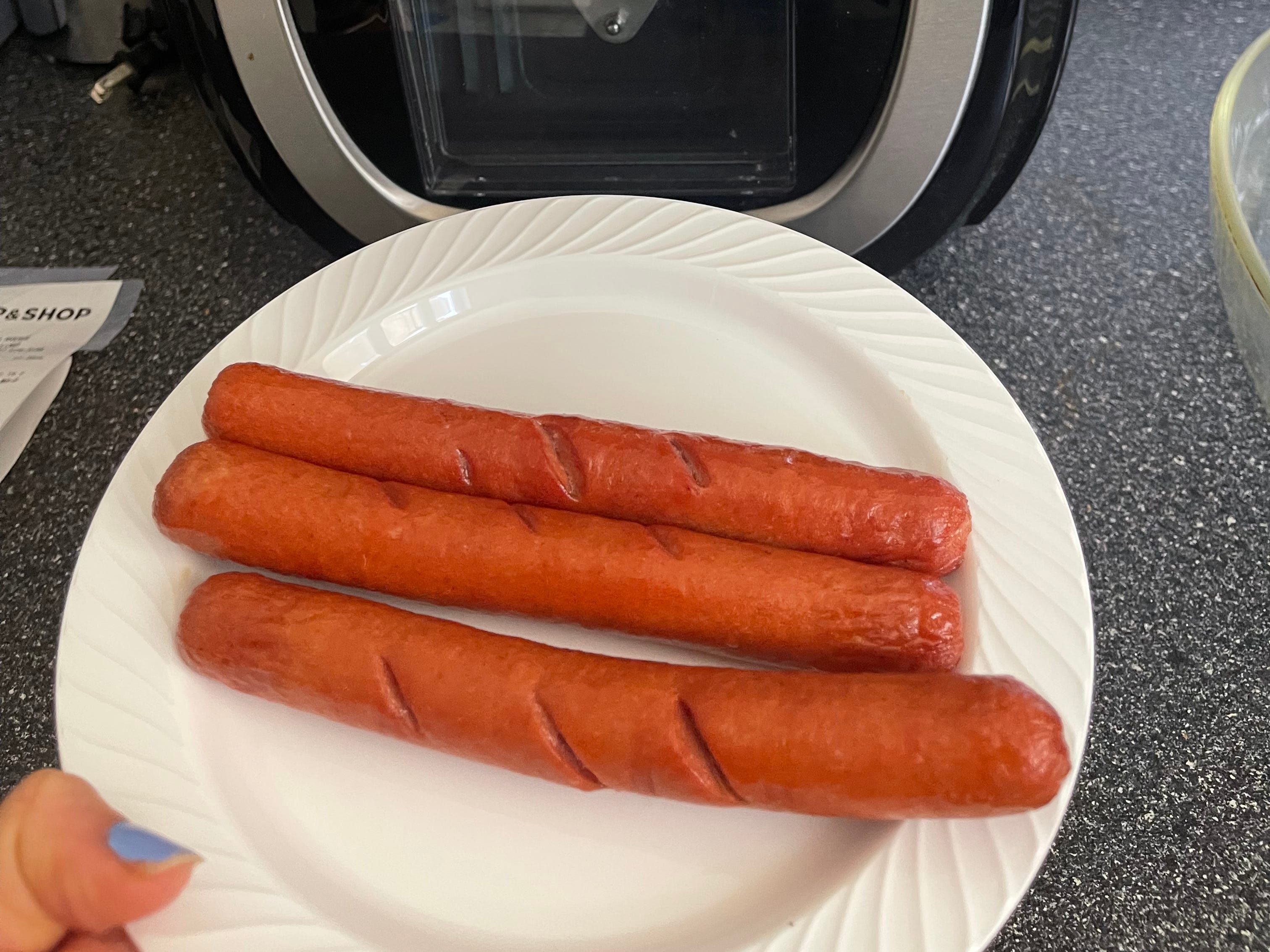 The end result of air frying hot dogs.
