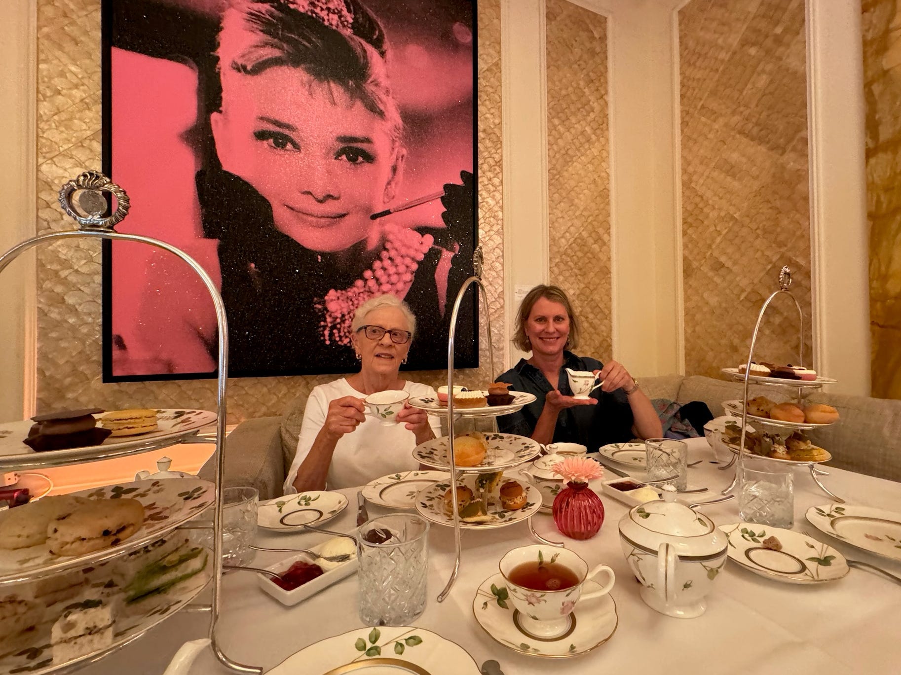 The author's grandmother and mother posing at high tea.