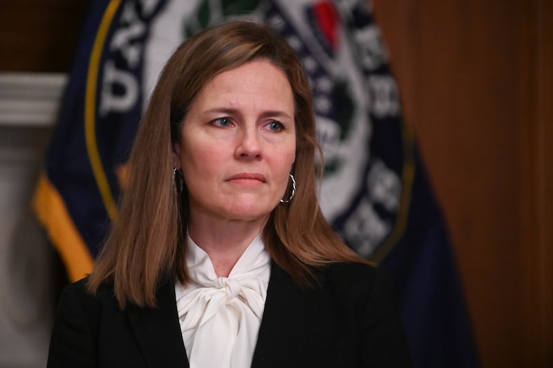 WASHINGTON, DC - OCTOBER 01: Seventh U.S. Circuit Court Judge Amy Coney Barrett, President Donald Trump's nominee for the U.S. Supreme Court, meets with Sen. Joni Ernst (R-IA) as she prepares for her confirmation hearing, on Capitol Hill on October 1, 2020 in Washington, DC. (Photo by Erin Scott-Pool/Getty Images)