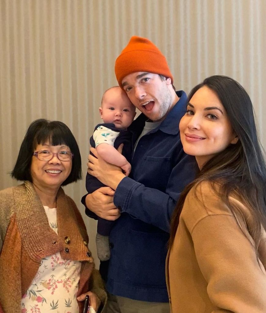 Olivia Munn and Jon Mulaney with her mom Kim and their son Malcolm in 2022. 