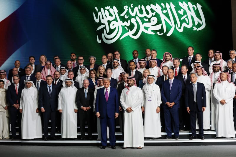President Donald J. Trump and Saudi Crown Prince Mohammed bin Salman pose for a photo with business leaders at the King Abdul Aziz International Conference Center while attending a Saudi-U.S. business investment forum on May 13, 2025, in Riyadh, Saudi Arabia.