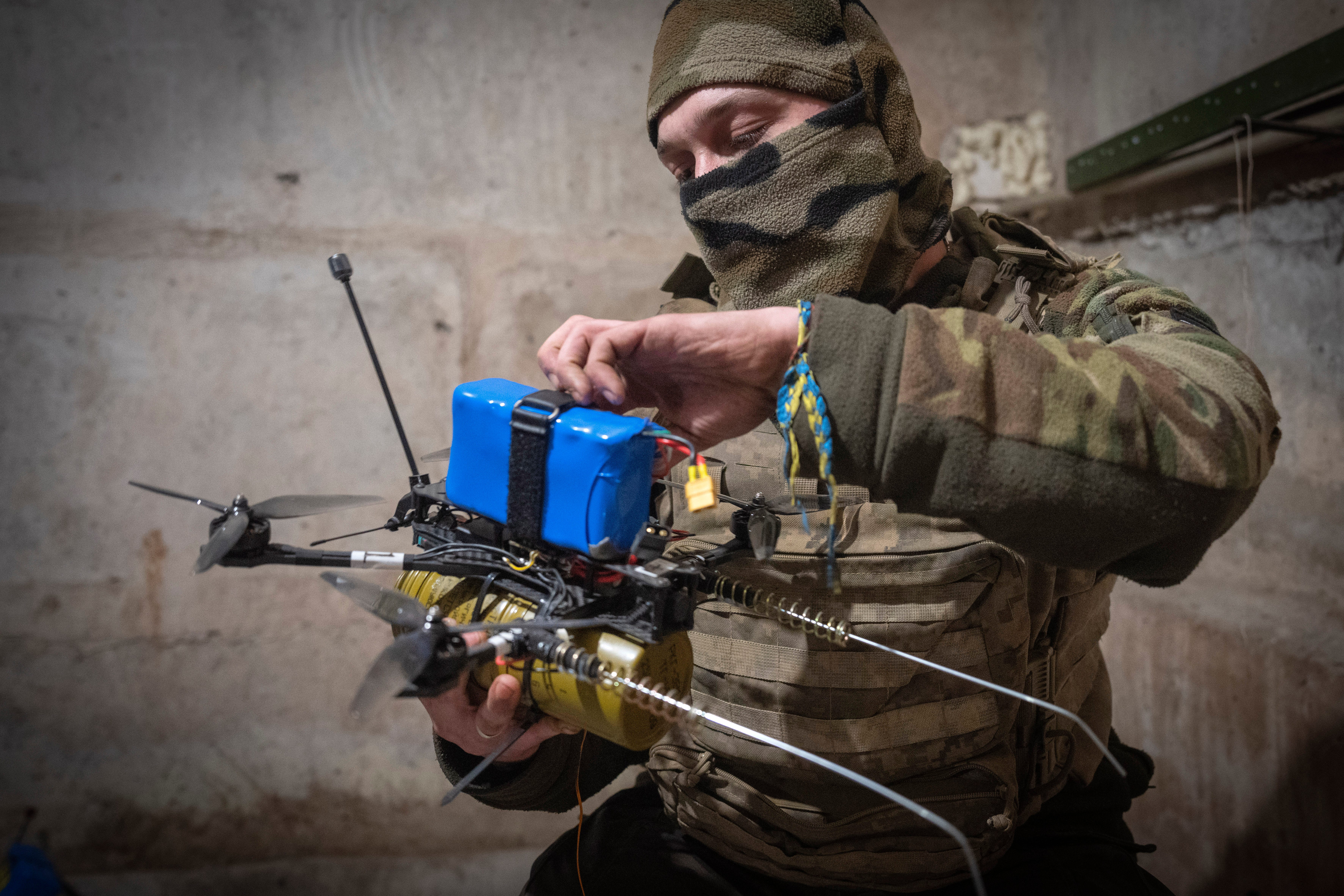 A Ukrainian soldier of the 71st Jaeger Brigade prepares a FPV drone at the frontline, near Avdiivka, Donetsk region, Ukraine, Friday, March 22, 2024.