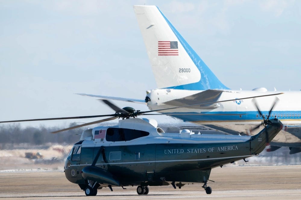 A VC-25A aircraft and a VH-3D Sea King helicopter taxi following former President Joe Biden's sendoff ceremony at Joint Base Andrews.