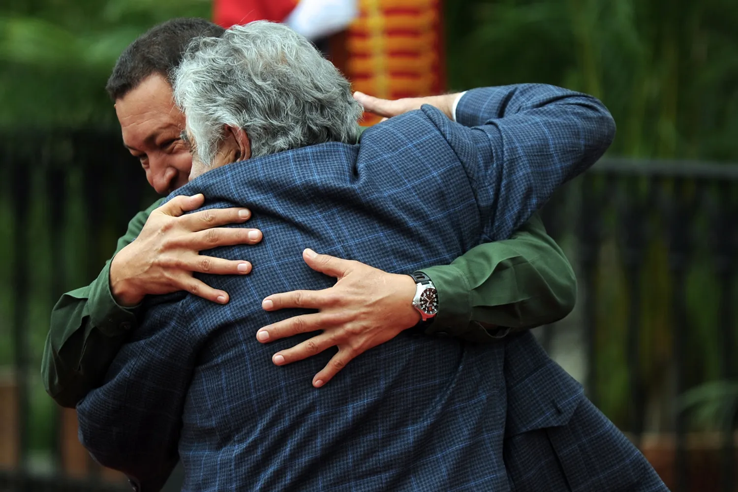 Two photos show José Mujica campaigning and on his inauguration day.
