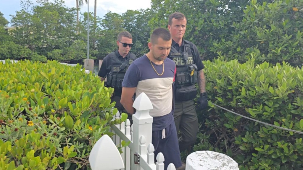 Nikolai Vilka, a Russian national, is seen being arrested after allegedly stealing a yacht and getting into a massive police chase in Florida.