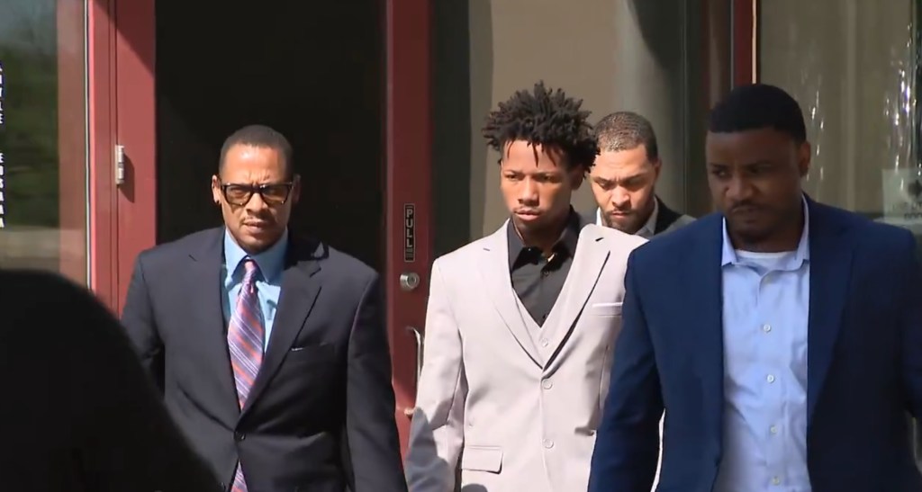Karmelo Anthony is escorted out of the Collin County Jail after posting the $250,000 bond.