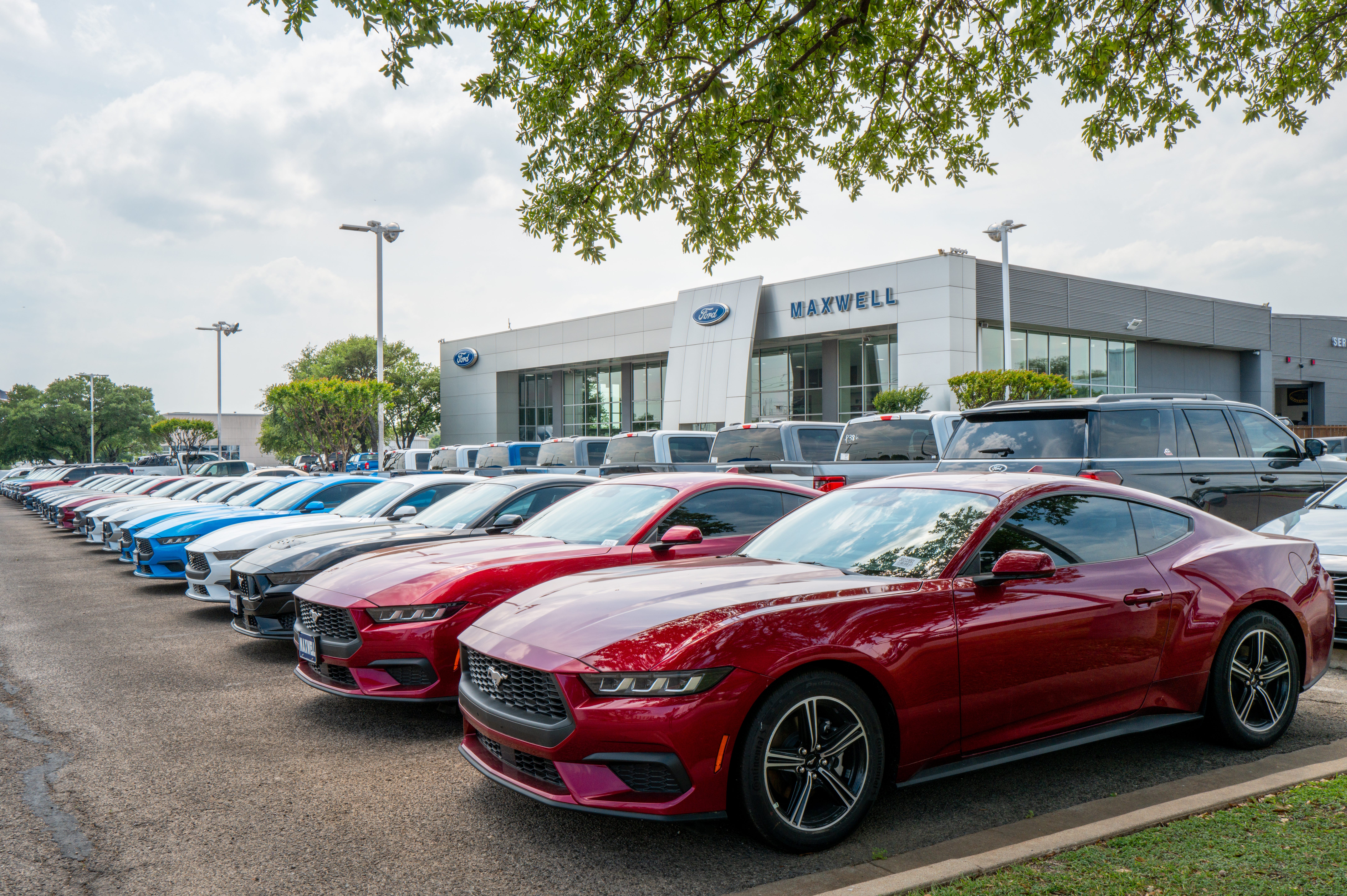 Ford Mustangs are seen on a lot at the dealership on April 18, 2025 in Austin, Texas.
