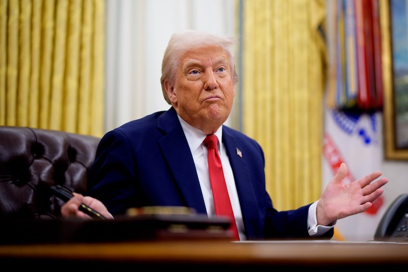 U.S. President Donald Trump gestures while speaking.