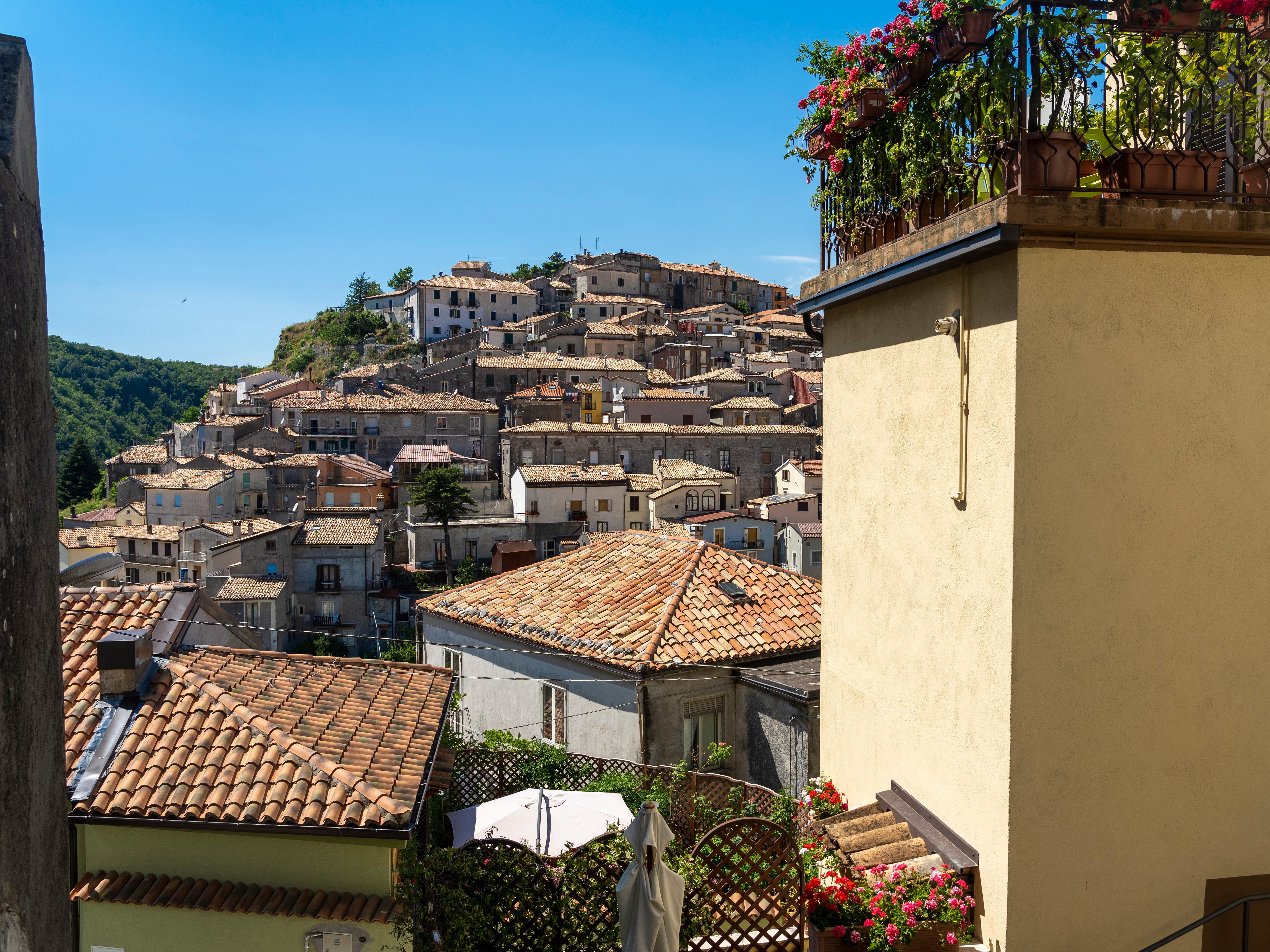 A wide shot of houses in Mormanno, Italy.