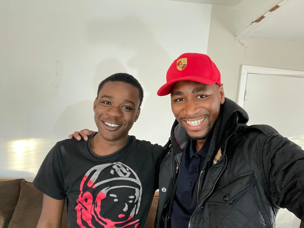 Fox News analyst Gianno Caldwell poses with his brother Christian Beamon for the younger sibling was killed in Chicacgo on June 24, 2022.