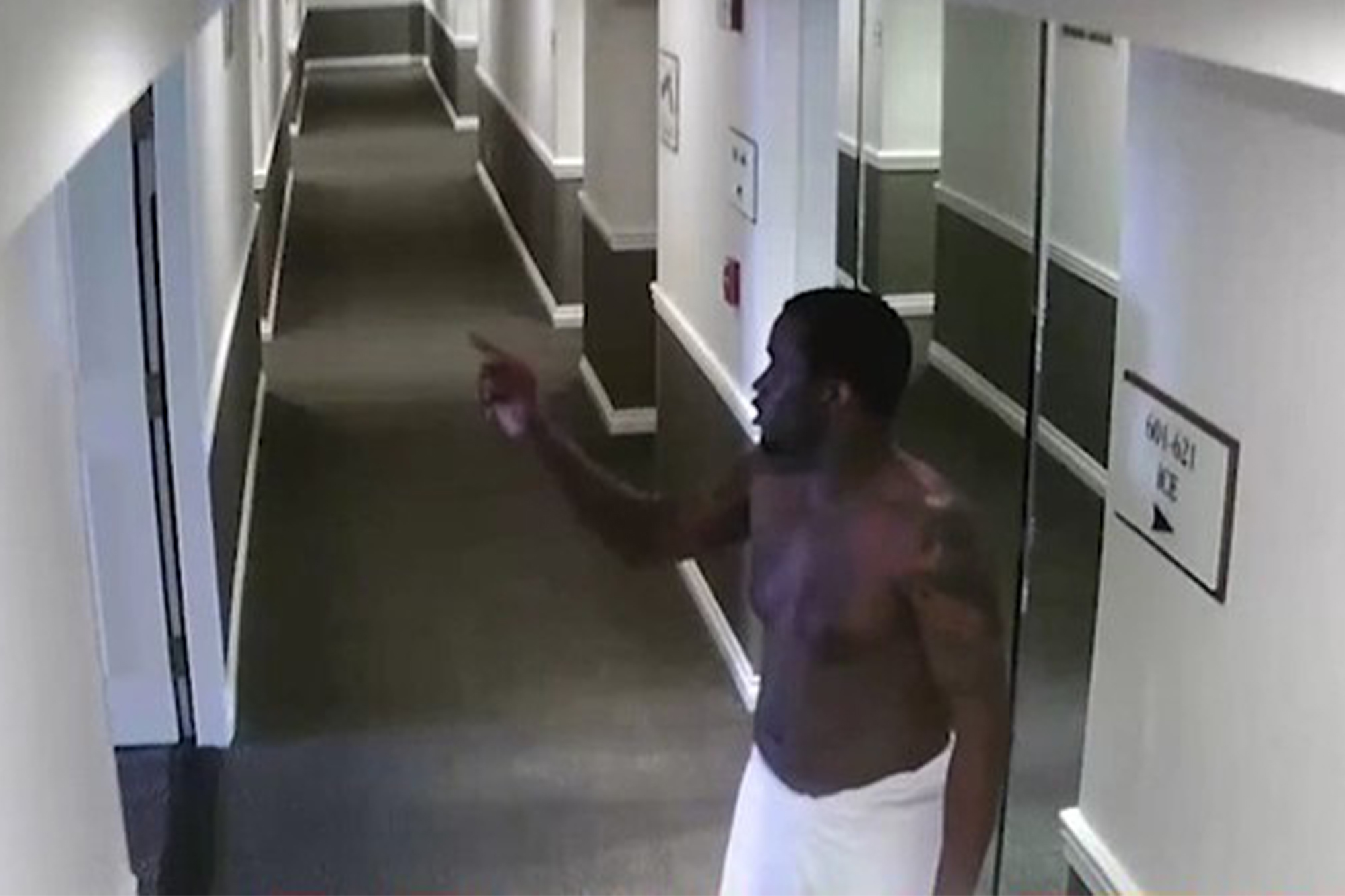 Sean Combs in a white towel