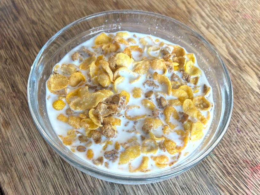 A bowl of Honey Bunches of Oats with milk.