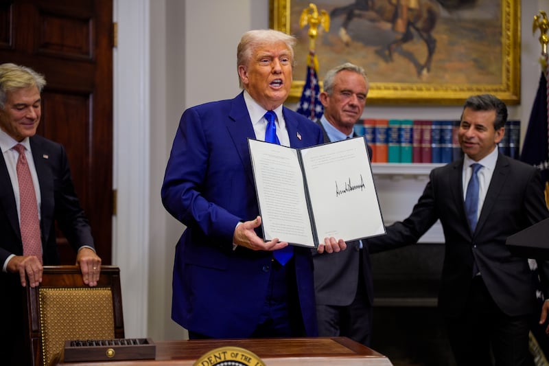 U.S. President Donald Trump with Health and Human Services Secretary Robert F. Kennedy Jr.