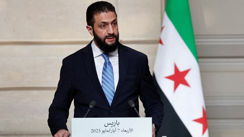 Syrian President Ahmed al-Sharaa speaks during a press conference at the Elysee Palace in Paris, France.