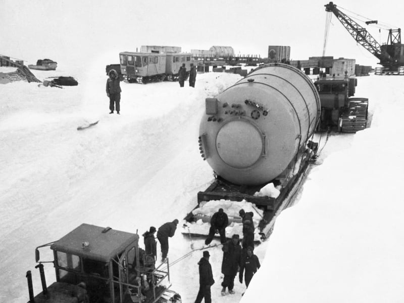 U.S. Army Engineers install move a vaper condenser, part of a portable nuclear power plant.