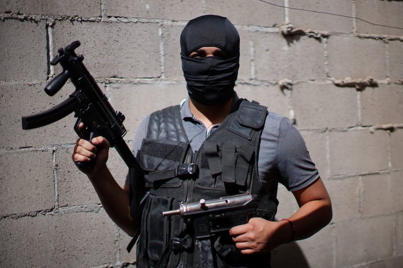 Hitman Manuel, 19, who claims to have killed 7 people, poses for a photo in Culiacan, Mexico, March 16, 2022.