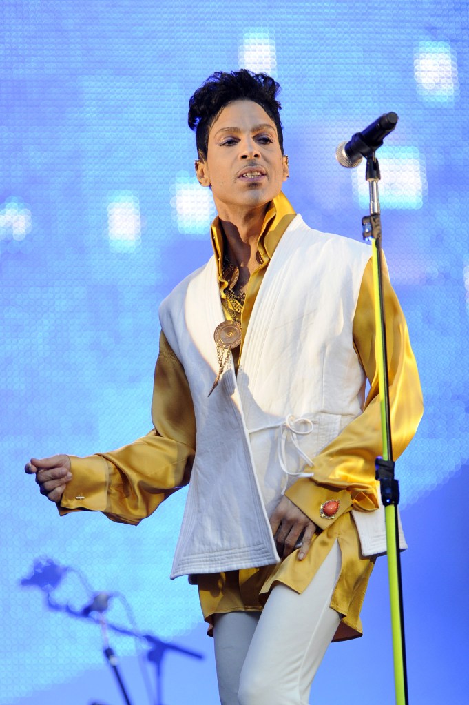 US singer and musician Prince (born Prince Rogers Nelson) performs on stage at the Stade de France in Saint-Denis, outside Paris, on June 30, 2011.