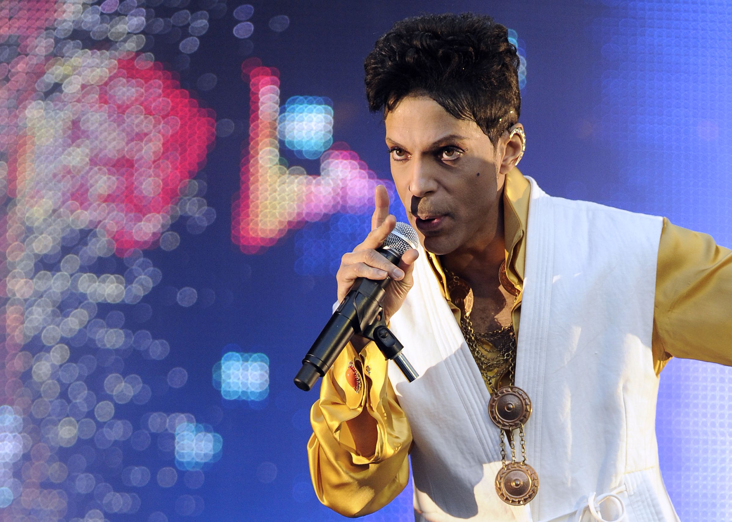 Prince performing on stage.