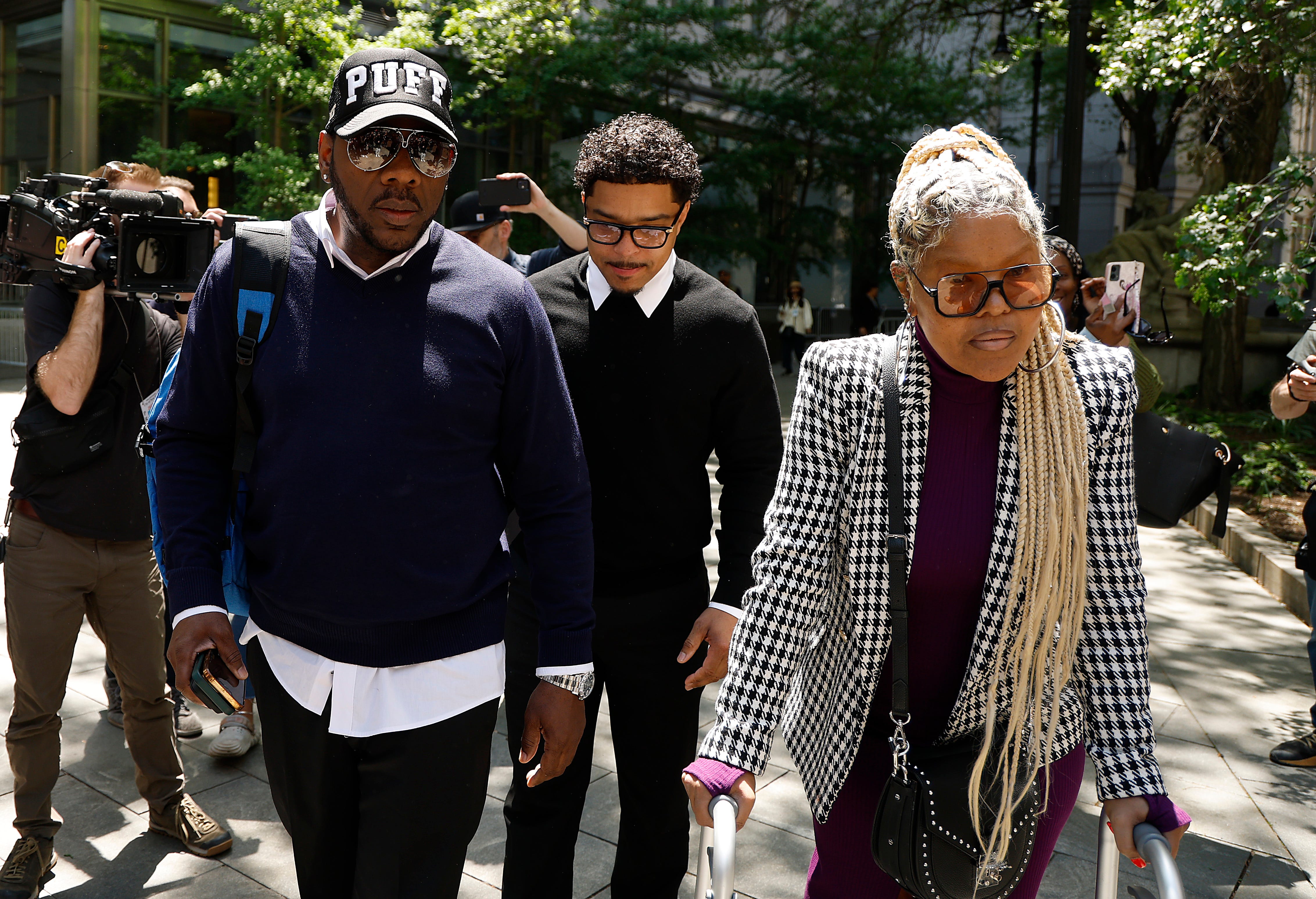 Charlie Liucci, Justin Combs, and Misa Hylton arrive at the courthouse for Diddy's criminal trial.