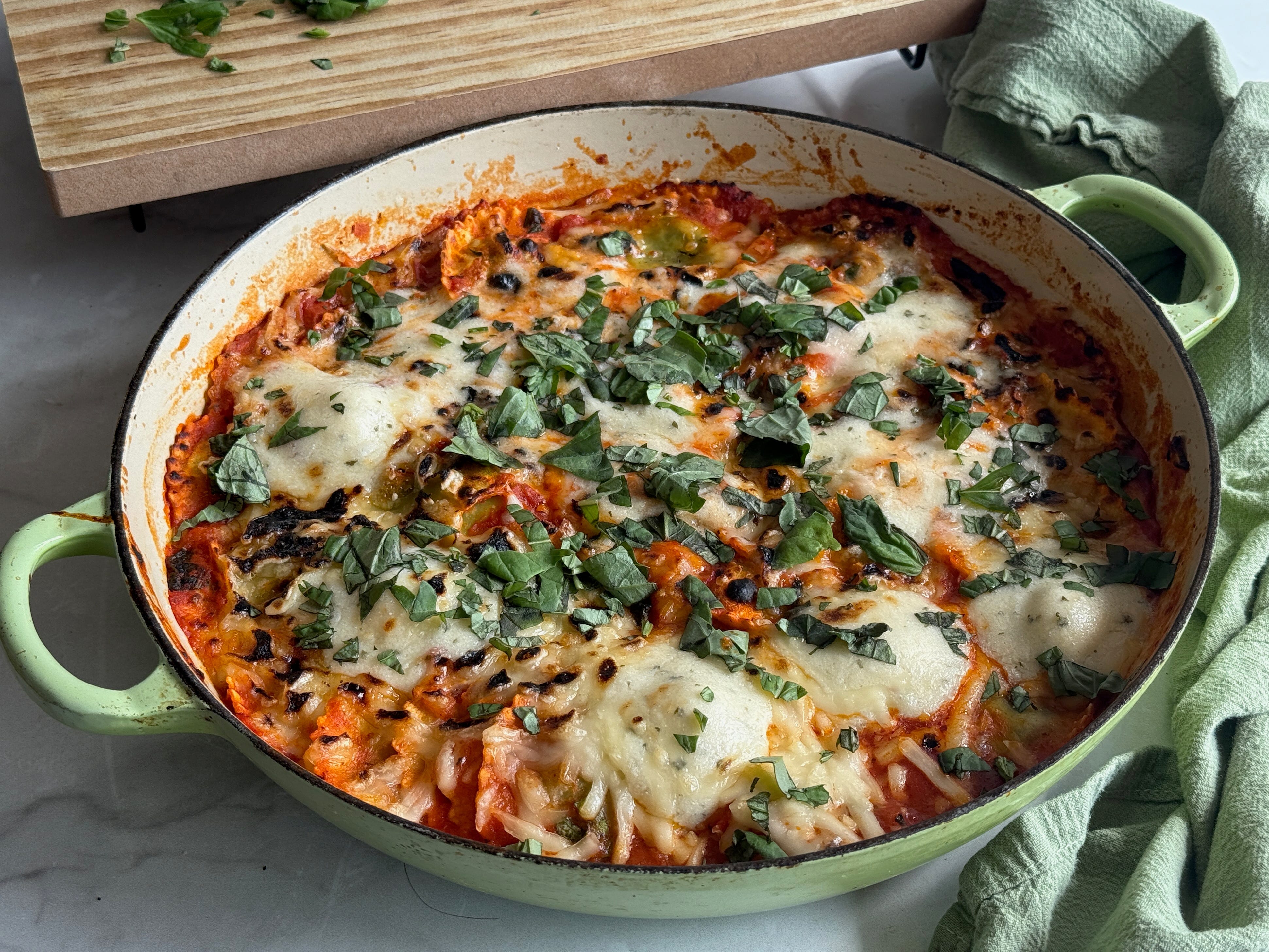 Lasagna in a round skillet.