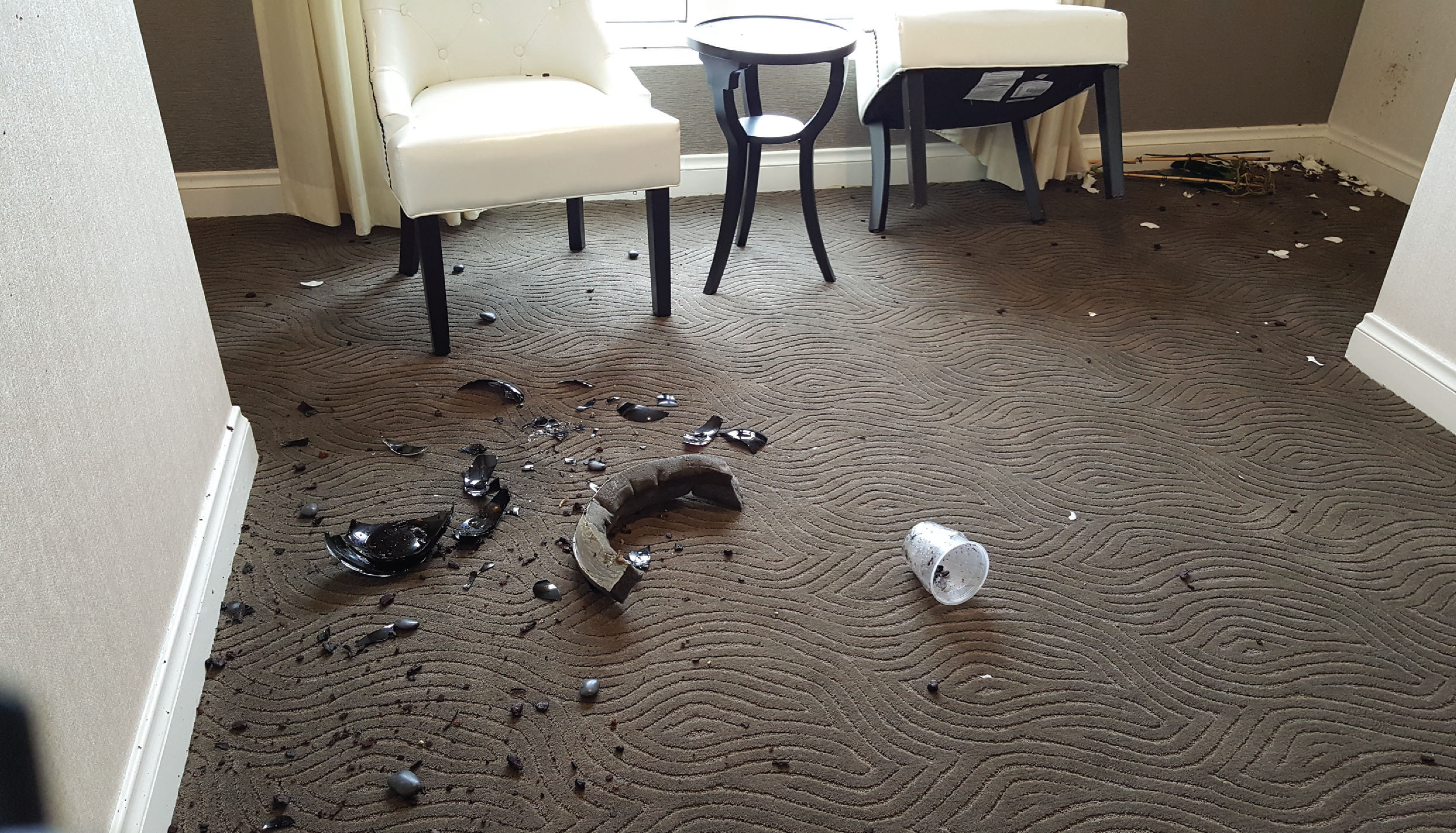 Garbage on a hotel floor.