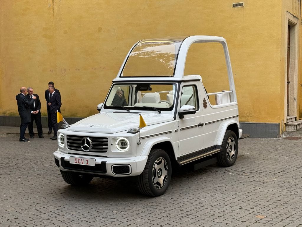 A Mercedes electric popemobile.
