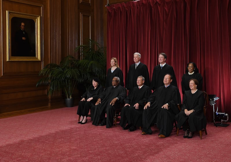 All nine justices of the U.S. Supreme Court pose for their official photo at the Supreme Court in Washington, D.C. on October 7, 2022.
