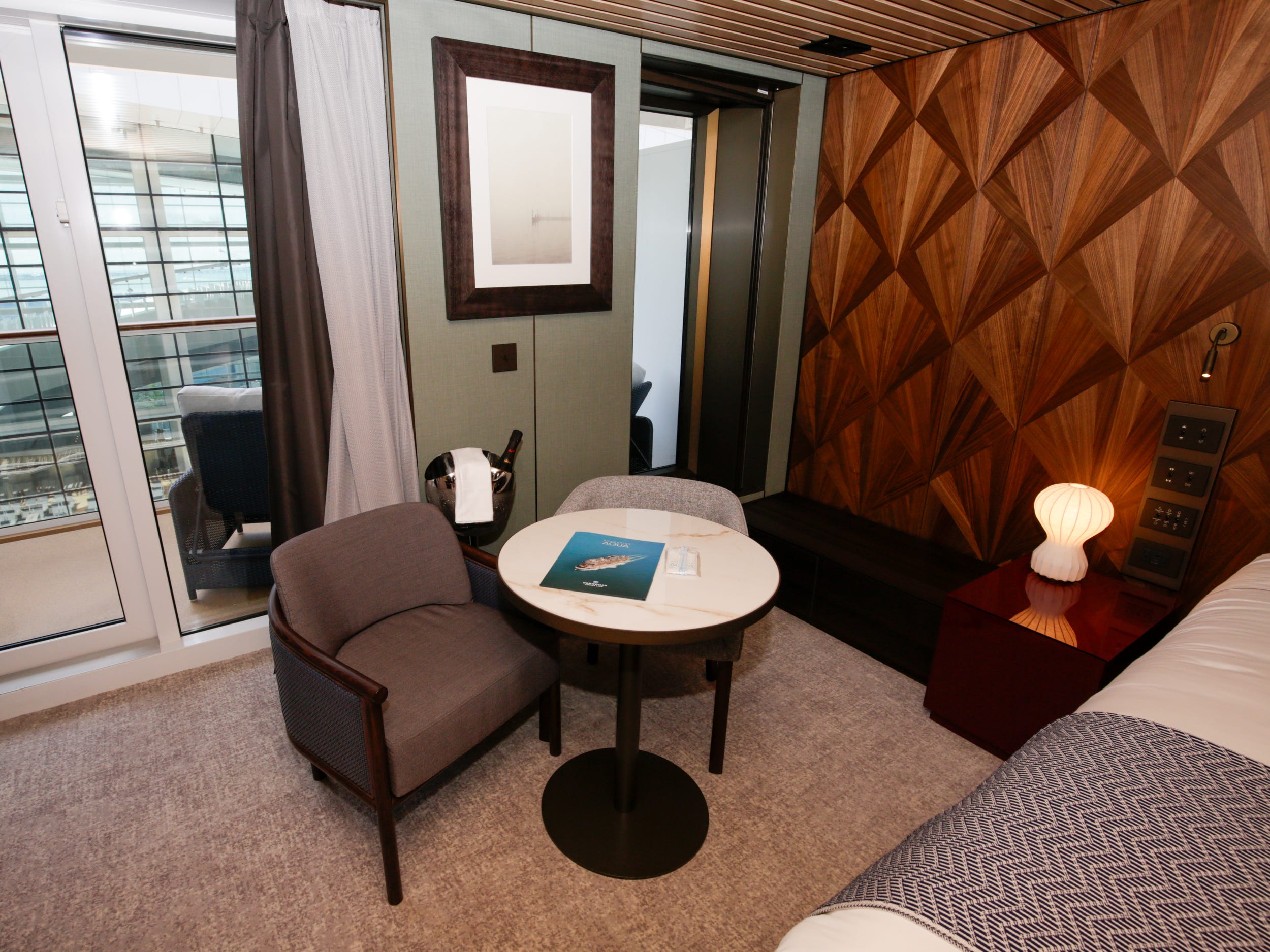 empty side dining table in the Haven Penthouse with Balcony on Norwegian Aqua