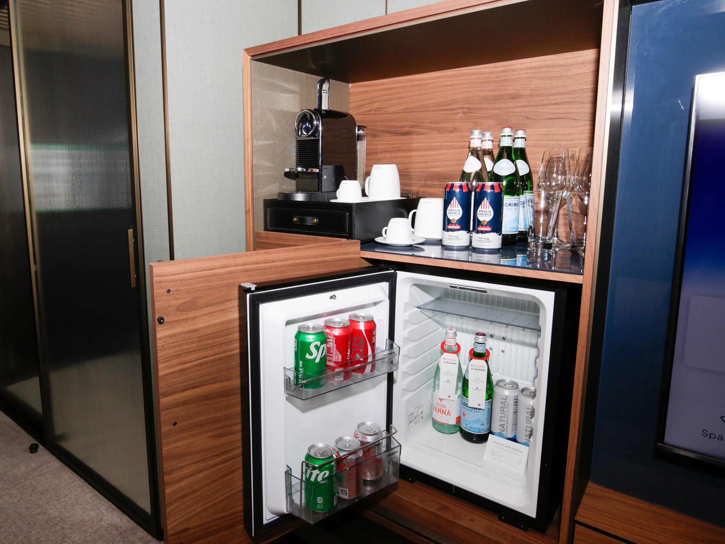 mini-fridge and espresso maker in the Haven Penthouse with Balcony on Norwegian Aqua