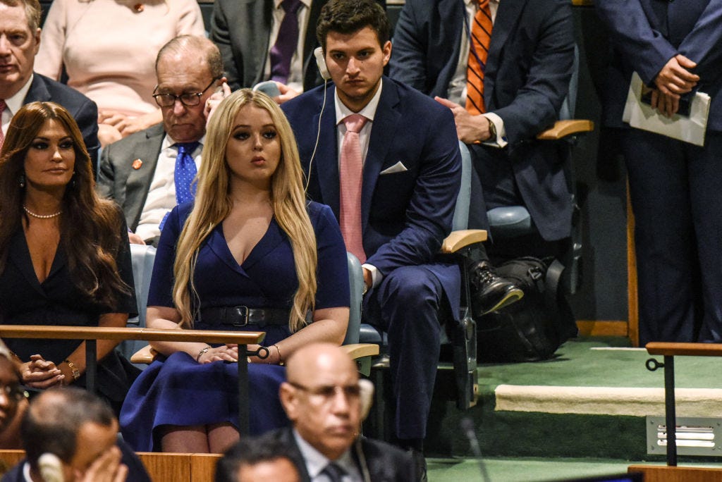 Tiffany Trump and Michael Boulos (sitting behind her) listen to Donald Trump's speech at the UN