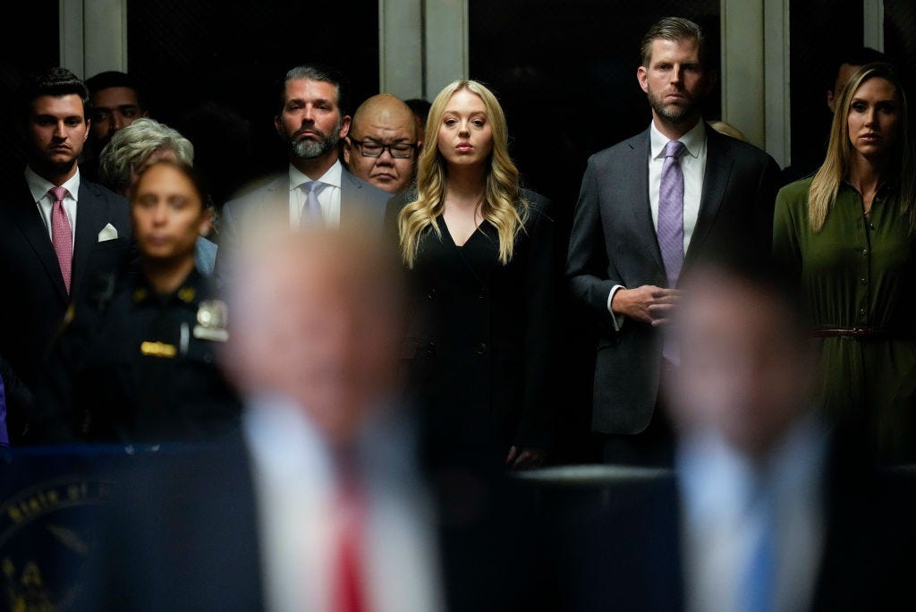Tiffany Trump and Michael Boulos with other Trump family members at the courthouse in New York City.