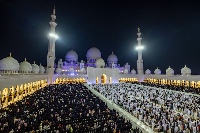 Muslims pray on Laylat al-Qadr, the Night of Destiny, believed to be when the Koran was first revealed to the Prophet Muhammad during the holy fasting month of Ramadan, at Sheikh Zayed Grand Mosque in Abu Dhabi on March 26, 2025.