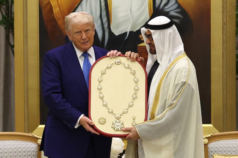 President Donald Trump receives the Order of Zayed, the country's highest civilian award during a bilateral meeting with UAE President Sheikh Mohamed bin Zayed Al Nahyan at Qasr al Watan (Palace of the Nation) on May 15, 2025, in Abu Dhabi, United Arab Emirates.