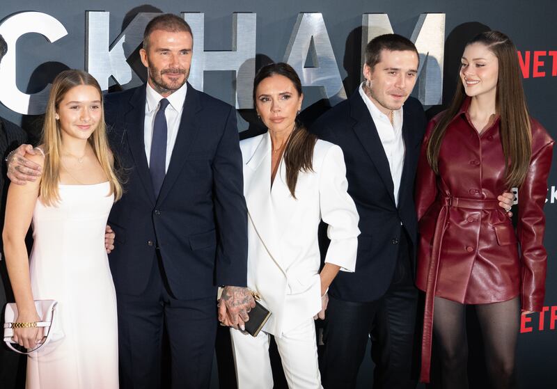 LONDON, ENGLAND - OCTOBER 03: (L-R)Harper Beckham, David Beckham, Victoria Beckham, Brooklyn Beckham and Nicola Peltz attend the Netflix 'Beckham' UK Premiere at The Curzon Mayfair on October 03, 2023 in London, England. (Photo by Samir Hussein/WireImage)