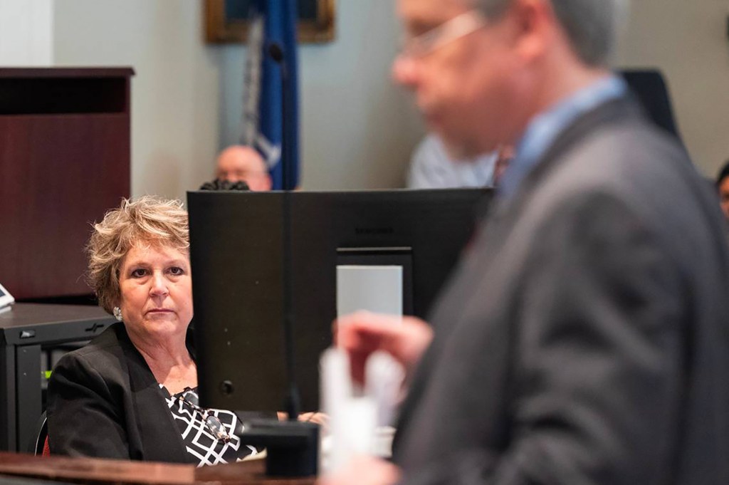 Colleton County Clerk of Court Becky Hill listens as Prosecutor Creighton Waters makes closing arguments in Alex Murdaugh's trial for murder at the Colleton County Courthouse on March 1, 2023, in Walterboro, South Carolina.