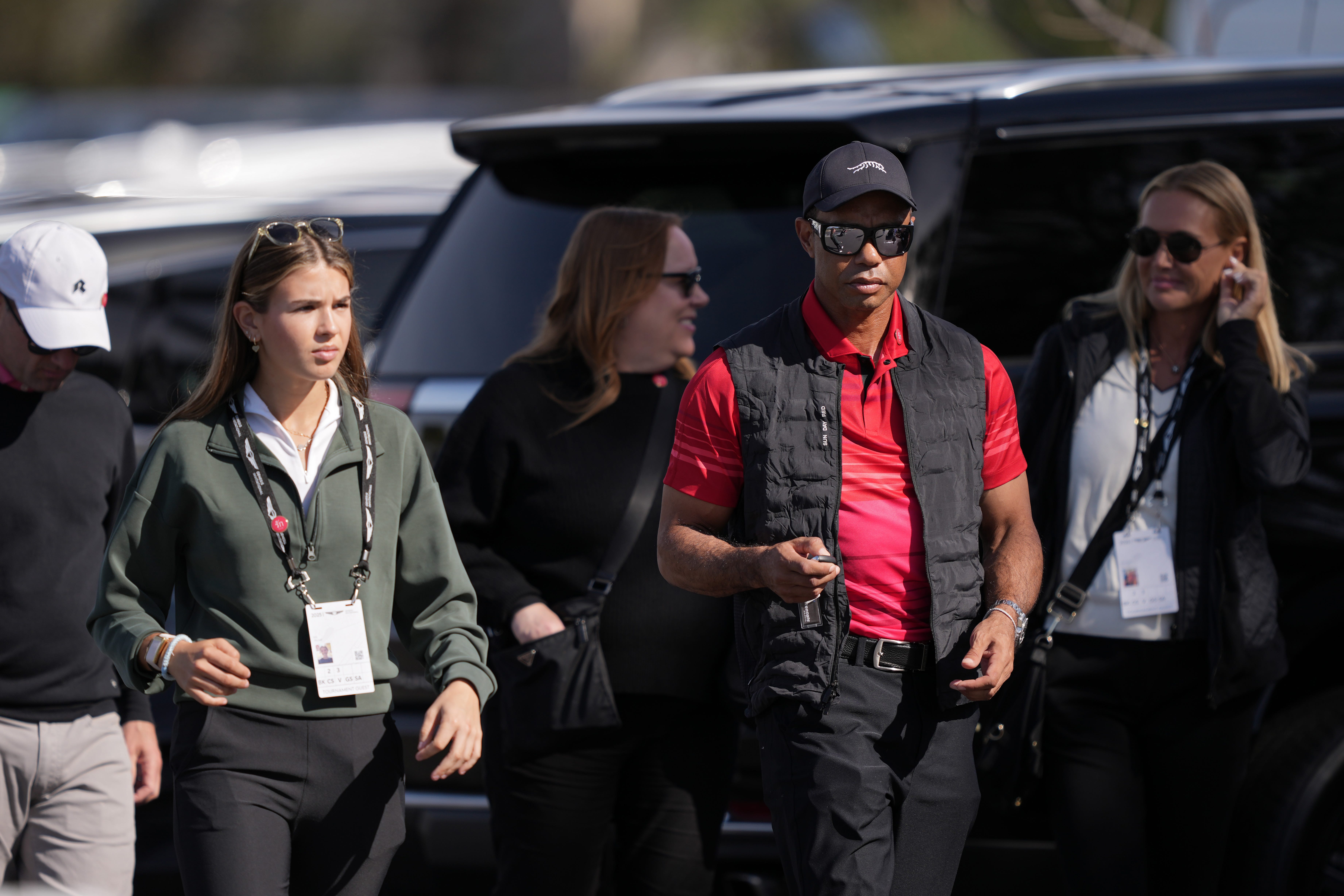 Tiger Woods arrives to The Genesis Invitational with Kai and Vanessa Trump