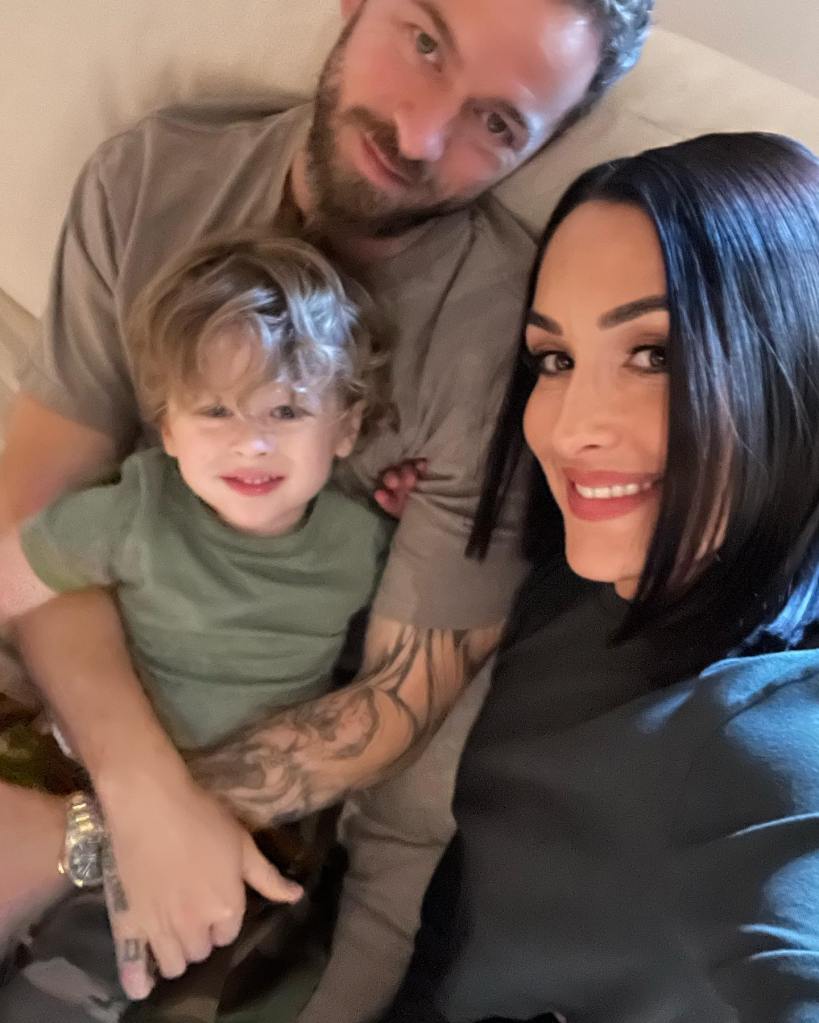 Artem Chigvintsev, Nikki Garcia and son via Instagram in October 2022