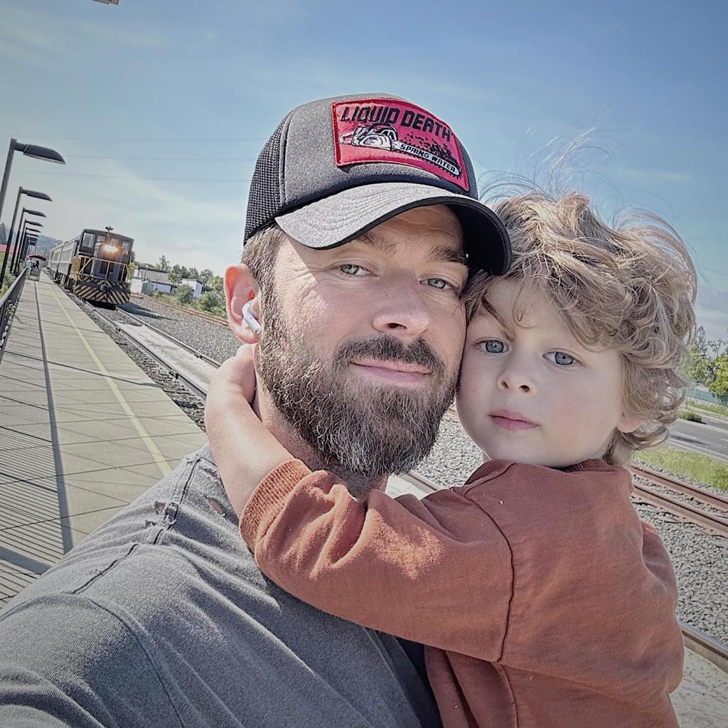 Artem Chigvintsev and son via Instagram in 2023
