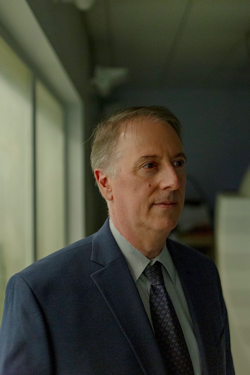 photo of man in suit and tie