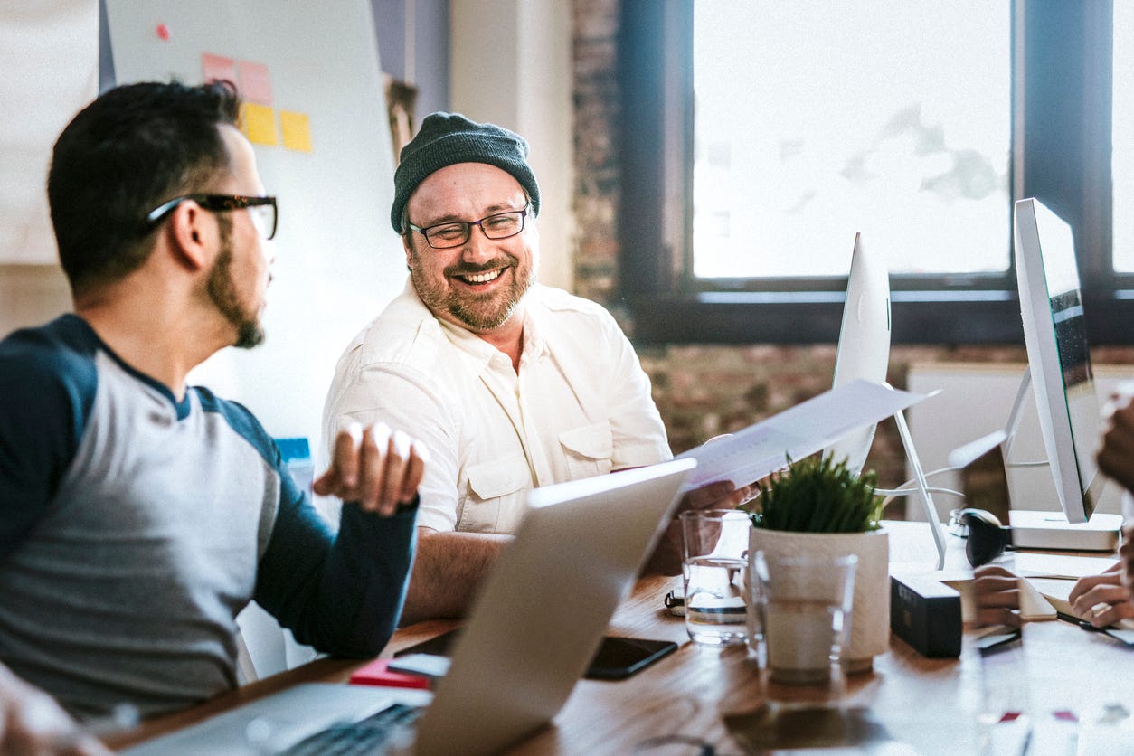 Two men working at a startup