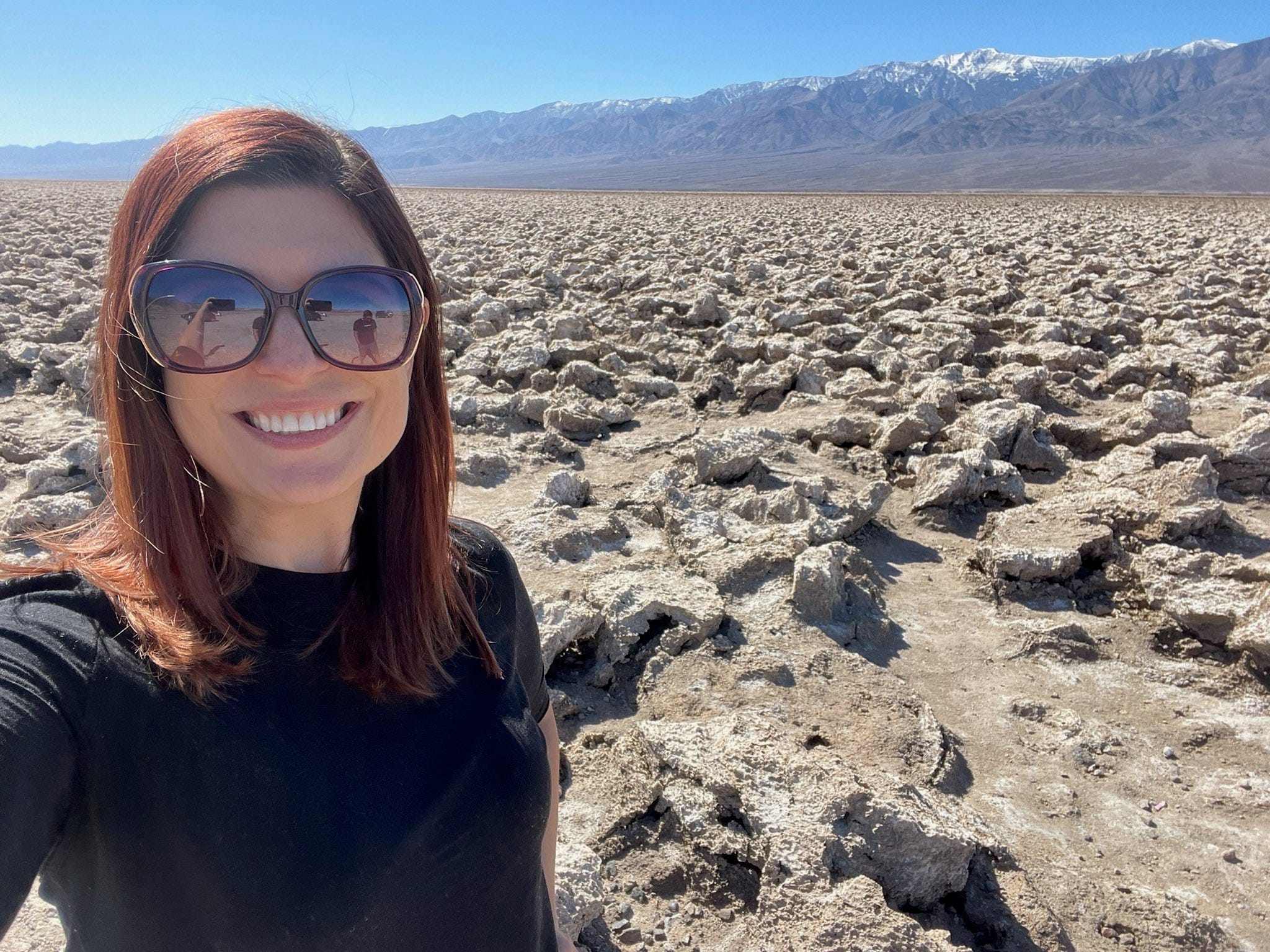 Author Amanda Adler smiling in Death Valley