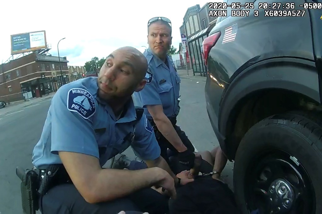 Former Minneapolis Police Department officer Derek Chauvin kneeling on George Floyd during police custody as officer J. Alexander Kueng assists, from a still of the body camera footage.