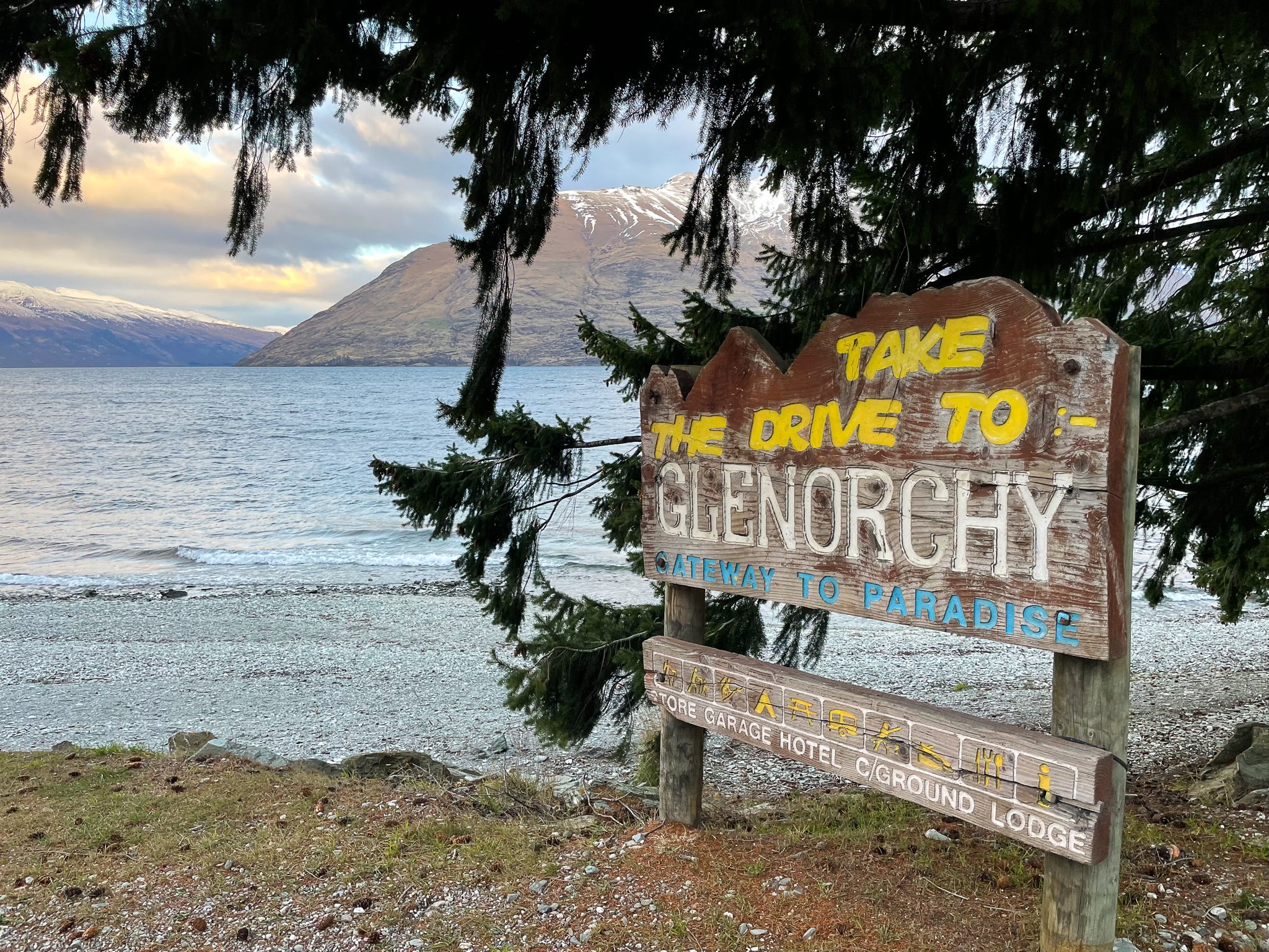 A sign that marks the start of the drive to Glenorchy, New Zealand.
